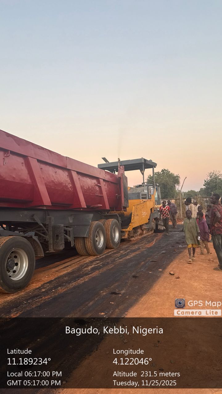 Kaoje, Kebbi State — asphalt paver at work